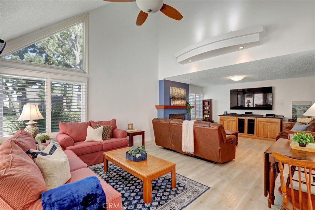 Bright & sunny floorplan! Living room with vaulted ceilings