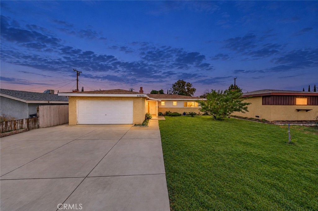Newer Driveway, Easily fits 4 cars. 2 Car Garage. Newer Driveway, Easily fits 4 cars. 2 Car Garage.