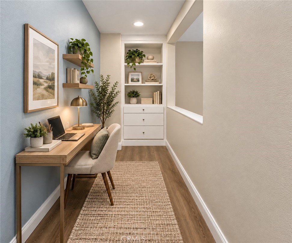 Versatile Upstairs Nook Featuring Built-In Shelving And Cabinetry, Wood-Look Flooring, And A Convenient Space For A Home Office Or Study Area. Digitally Staged