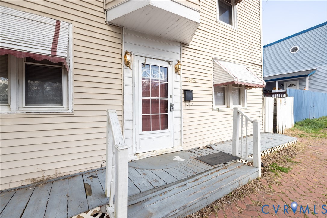 Doorway to property with a wooden deck Doorway to property with a wooden deck