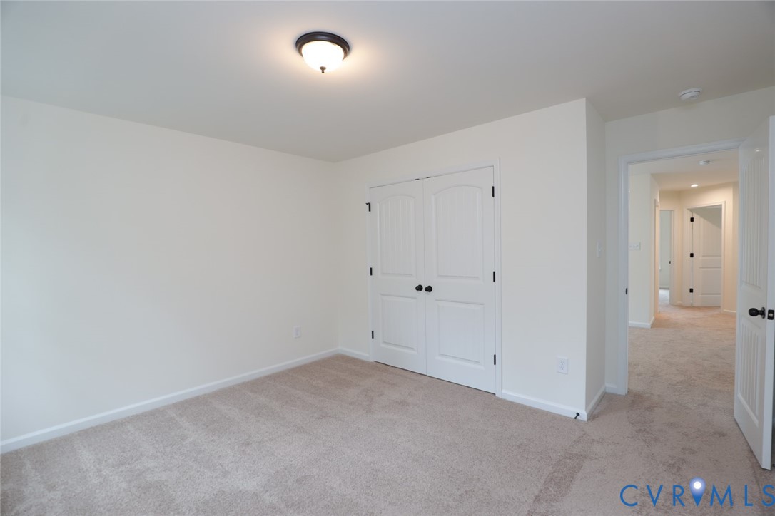 The photo represents the plan, not the actual home. Design selections may vary. Upstairs, youll find three additional bedrooms with double-door closets that share a full hall bath with tub/shower combo.