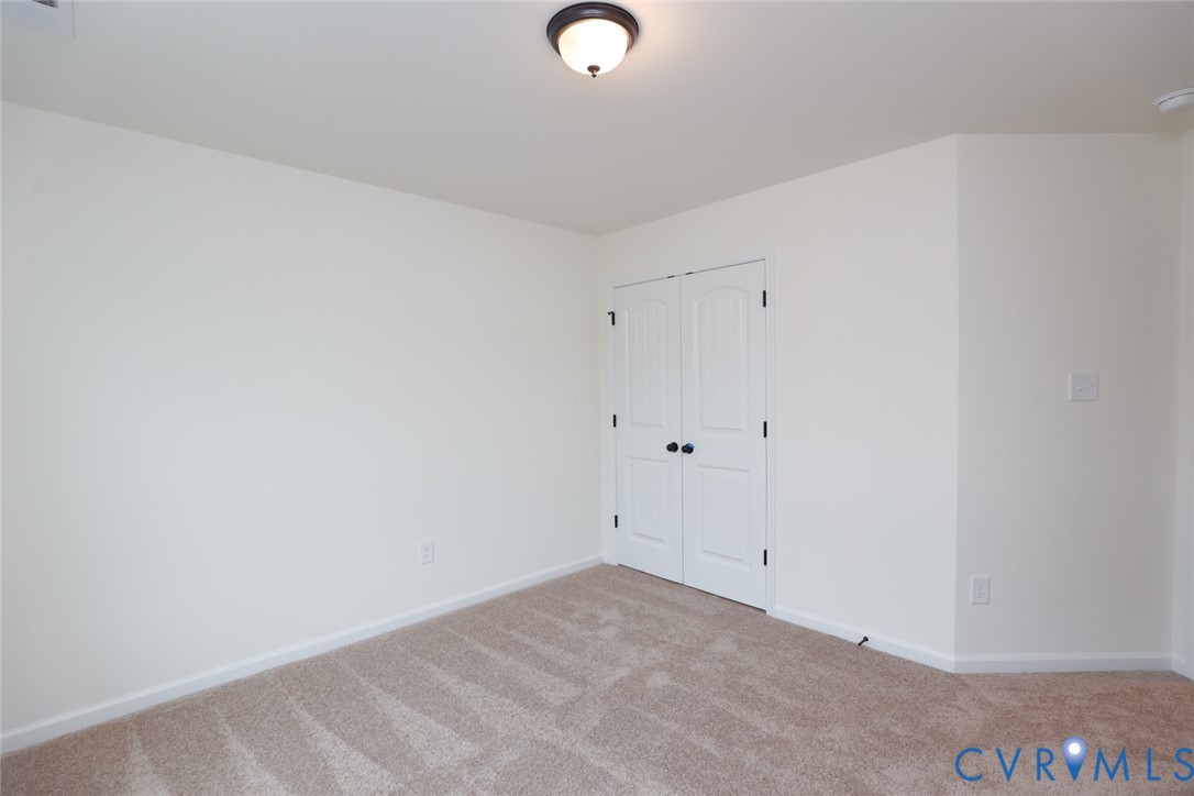 The photo represents the plan, not the actual home. Design selections may vary. Upstairs, youll find three additional bedrooms with double-door closets that share a full hall bath with tub/shower combo.
