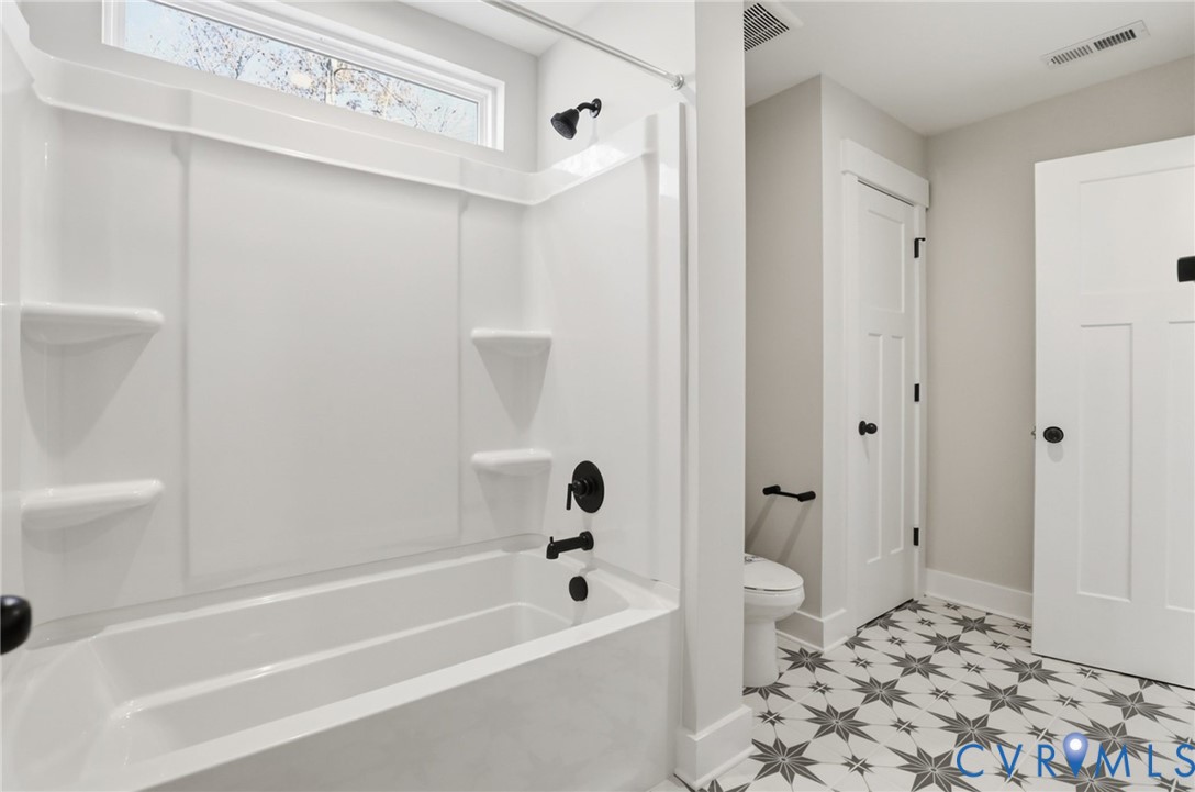 This home is to be built. The photo represents the plan, not the actual home. Design selections may vary.