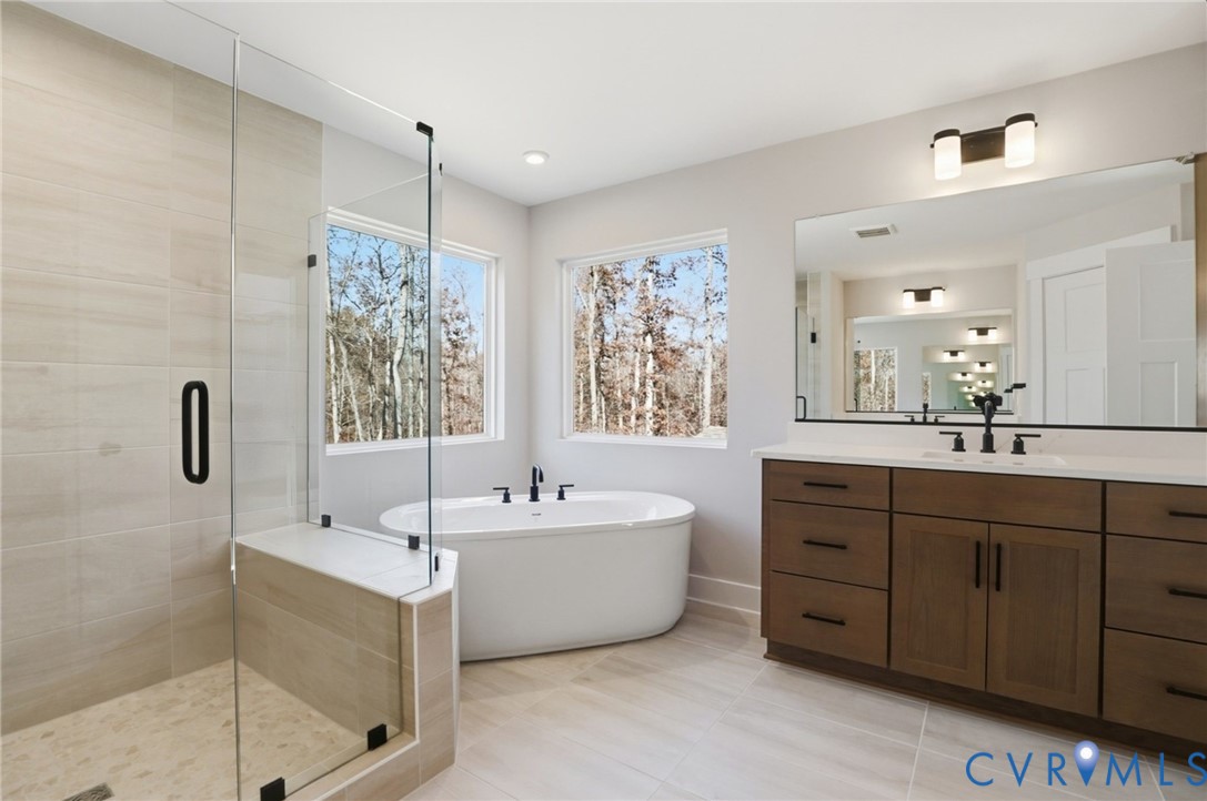 This home is to be built. The photo represents the plan, not the actual home. Design selections may vary.
