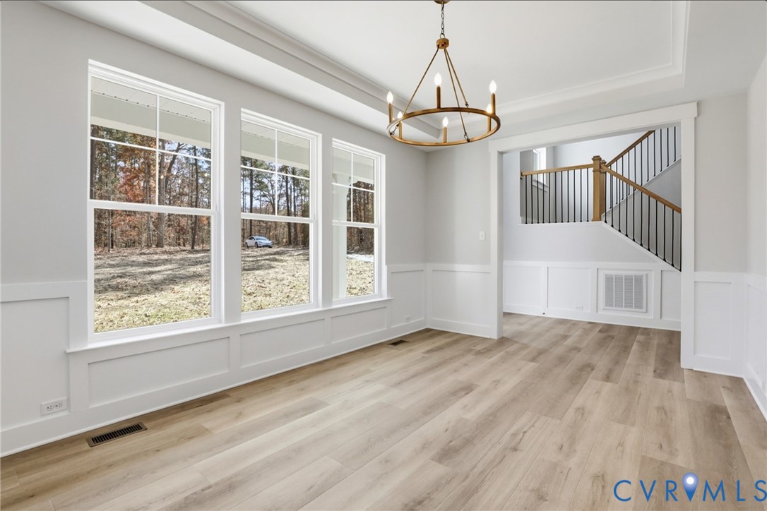 This home is to be built. The photo represents the plan, not the actual home. Design selections may vary.