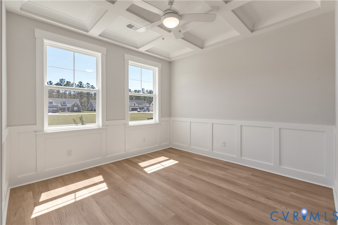 Optional Addition of Coffered Ceilings. This home is to be built. The photo represents the plan, not the actual home. Designs has been selected.