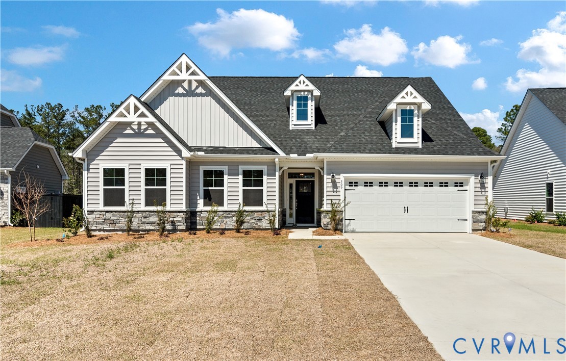 This home is to be built. The photo represents the plan, not the actual home. Designs has been selected.