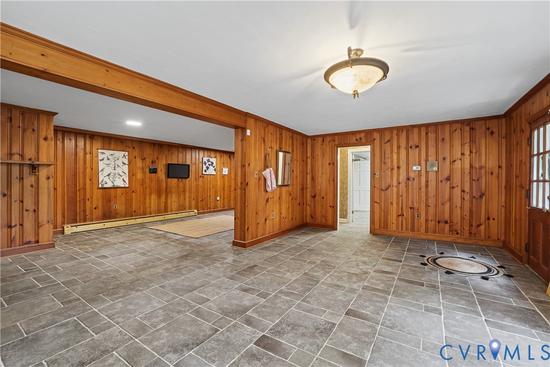 Basement Game Area with Door to Back Patio