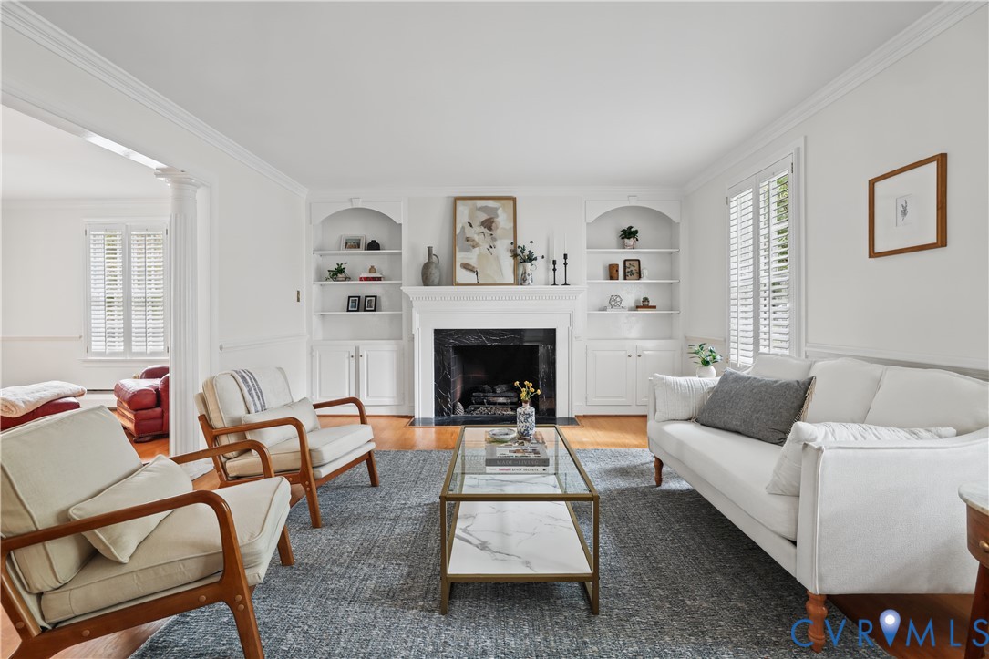 Fireplace with a dark stone surround and