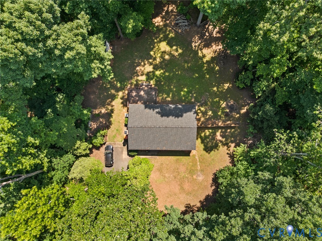 Aerial view showing wooded lot