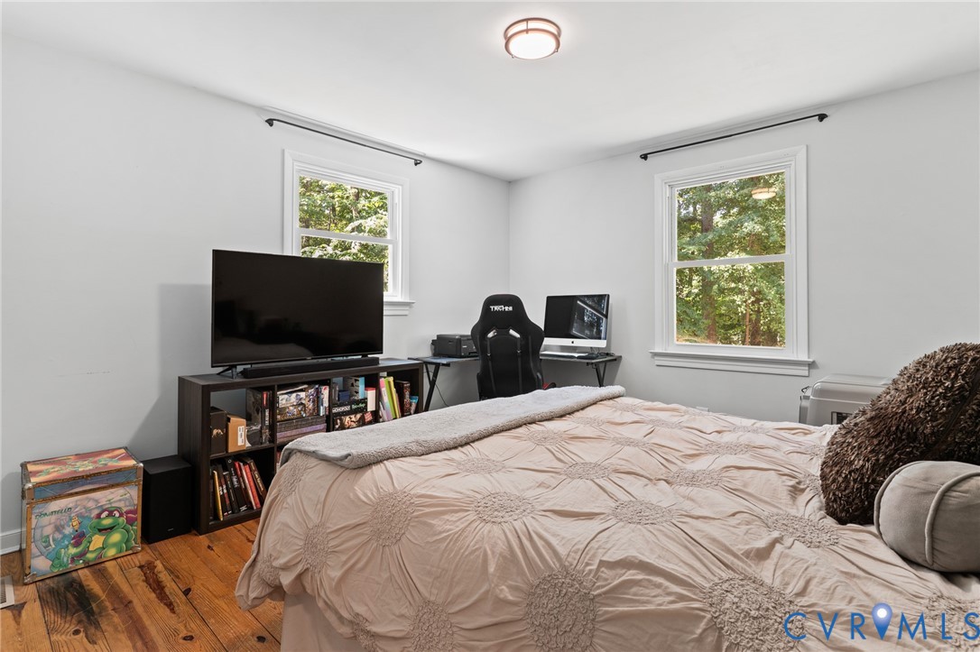 Bedroom 2 with pine wood floors