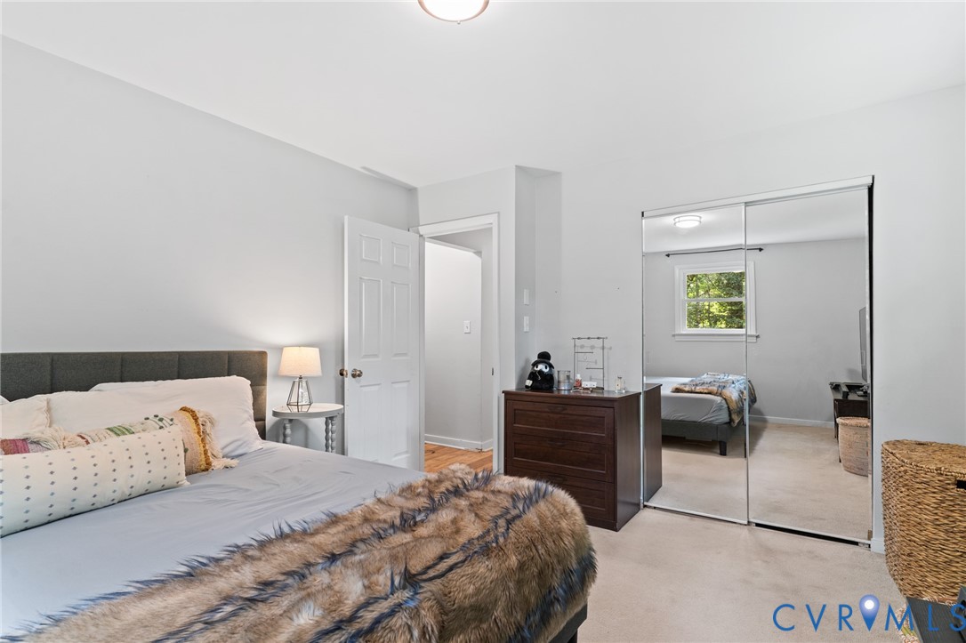 Another view of the primary bedroom