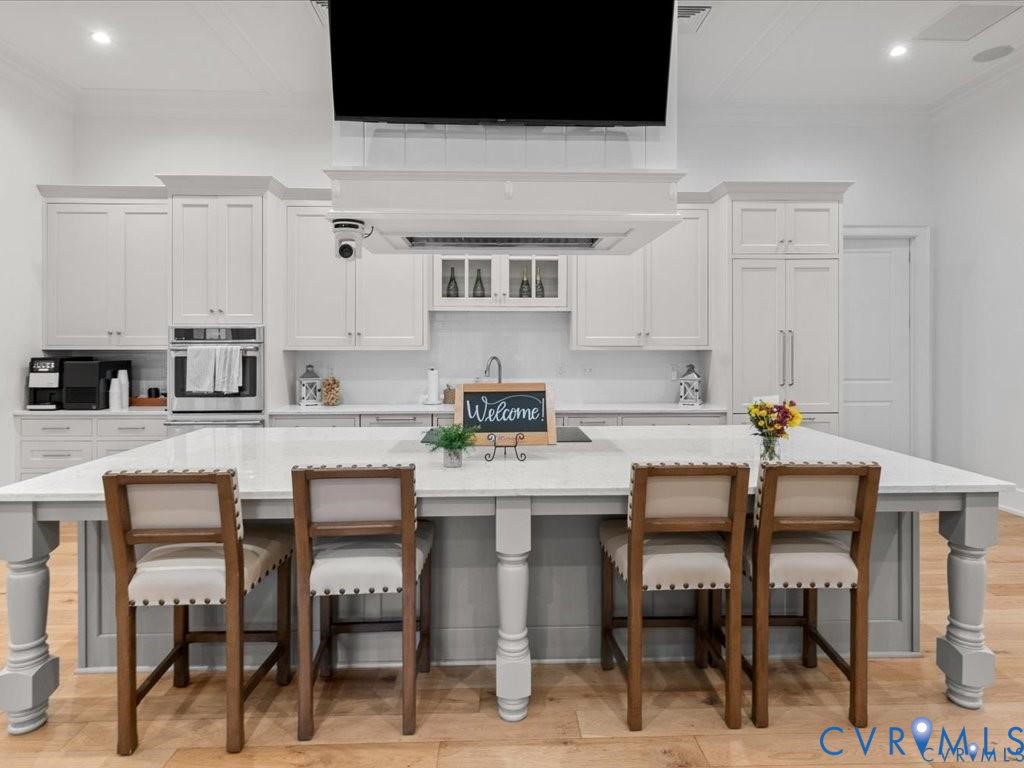 See yourself gathering here...the Connexions chef-inspired kitchen brings people, moments and memories together.