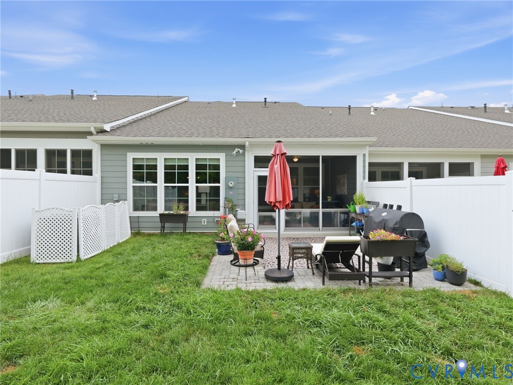 Picture evenings on the patio, weekends grilling, and peaceful views from the porch, this fenced-in, versatile backyard makes it all possible.