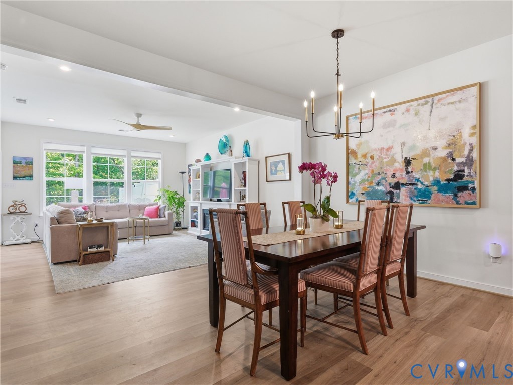 From casual dinners to special celebrations, this inviting dining area (with updated chandelier) is made for good food, great company, and memories that last a lifetime. From casual dinners to special celebrations, this inviting dining area (with updated chandelier) is made for good food, great company, and memories that last a lifetime.