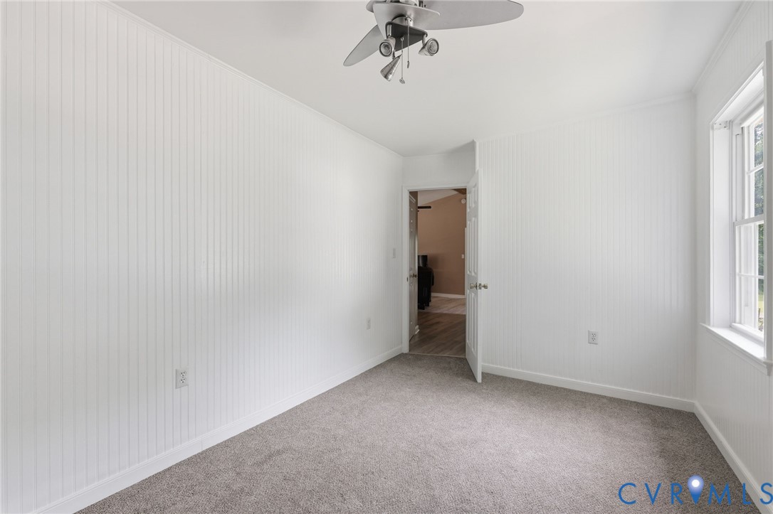 Bedroom with walk-in closet.