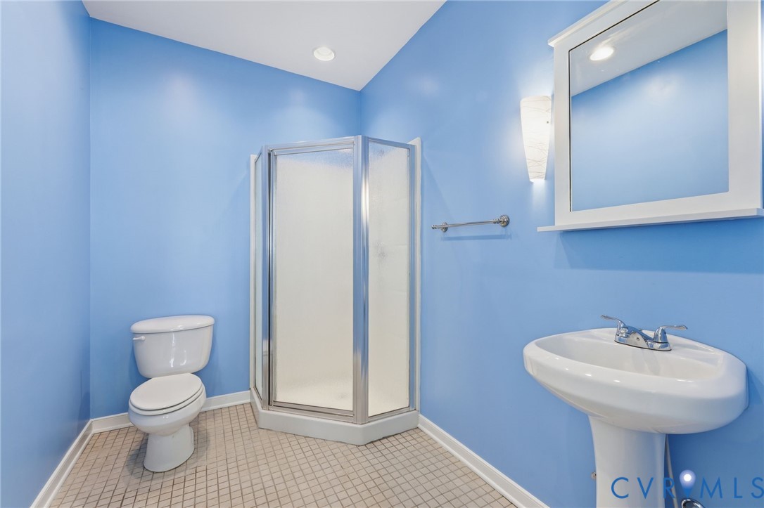 Full bath with shower inside the pool house.