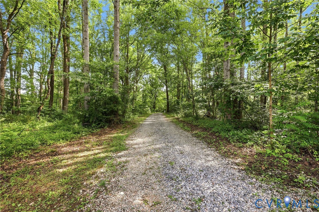 Private drive to a private oasis in the woods. Private drive to a private oasis in the woods.
