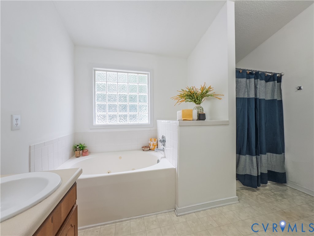 Primary Bathroom, large garden tub, separate shower