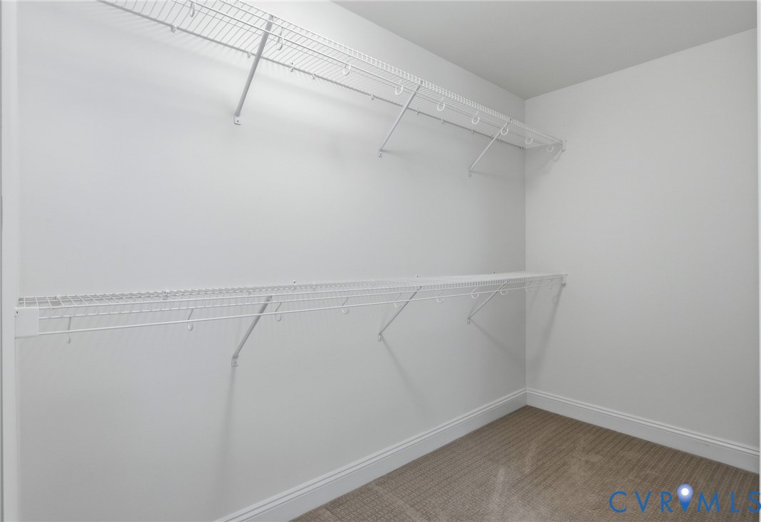 Interior closet with carpet flooring