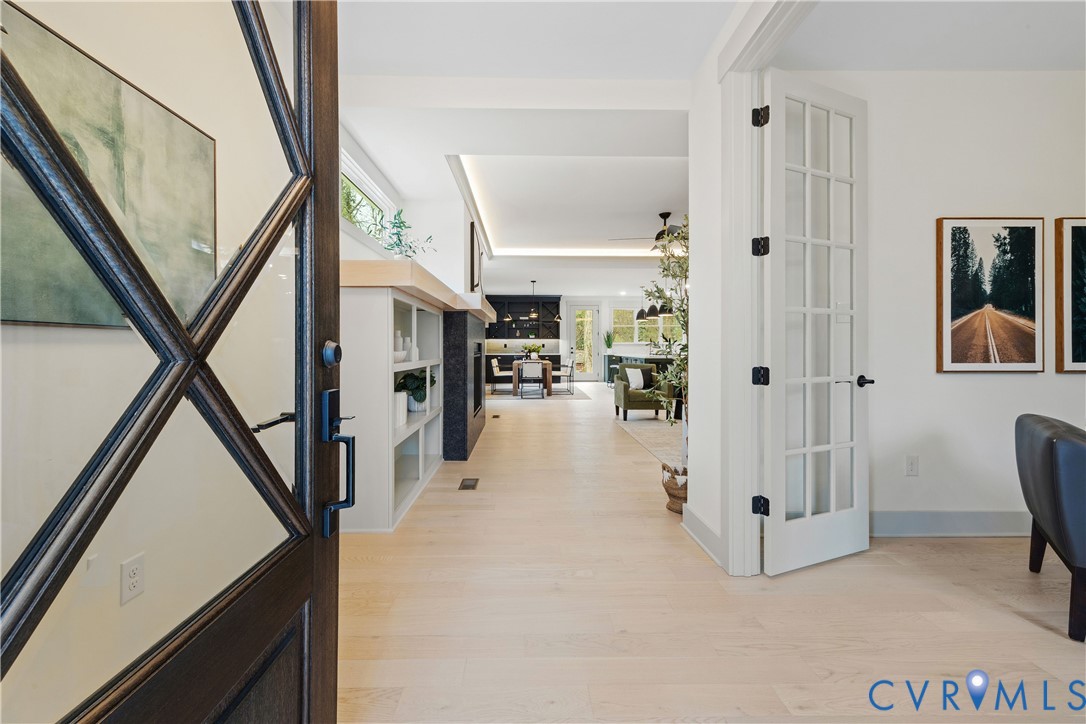 Arched entry door with decorative glass panels and dark wood finish Arched entry door with decorative glass panels and dark wood finish