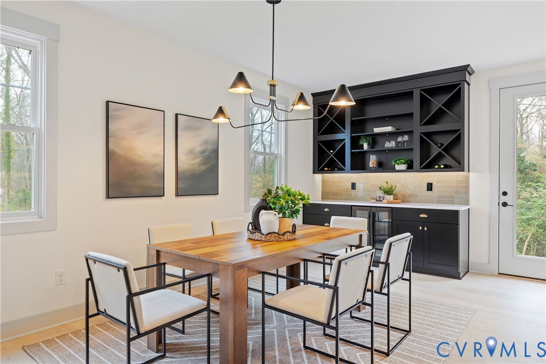 dining area with built in dry bar & wine fridge
