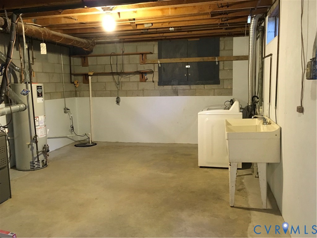 Sump Pump Located Next To Water Heater