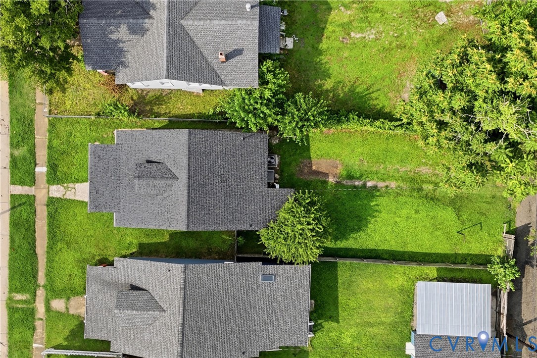 Aerial view highlighting property lines and green spaces