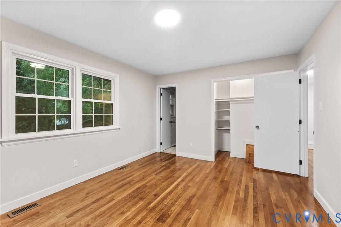Hardwood flooring complementing light-toned walls