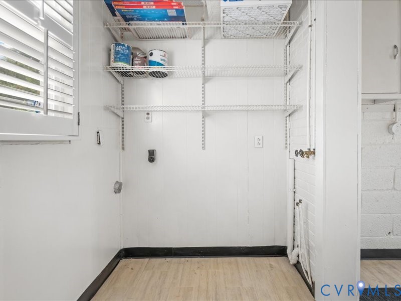 Located in the side mudroom.  Great storage.