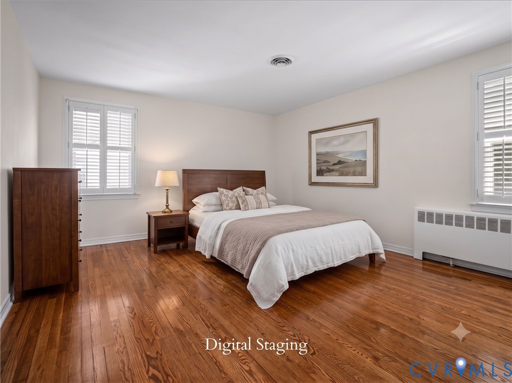 Digital Staging.  Refinished hardwood floors.