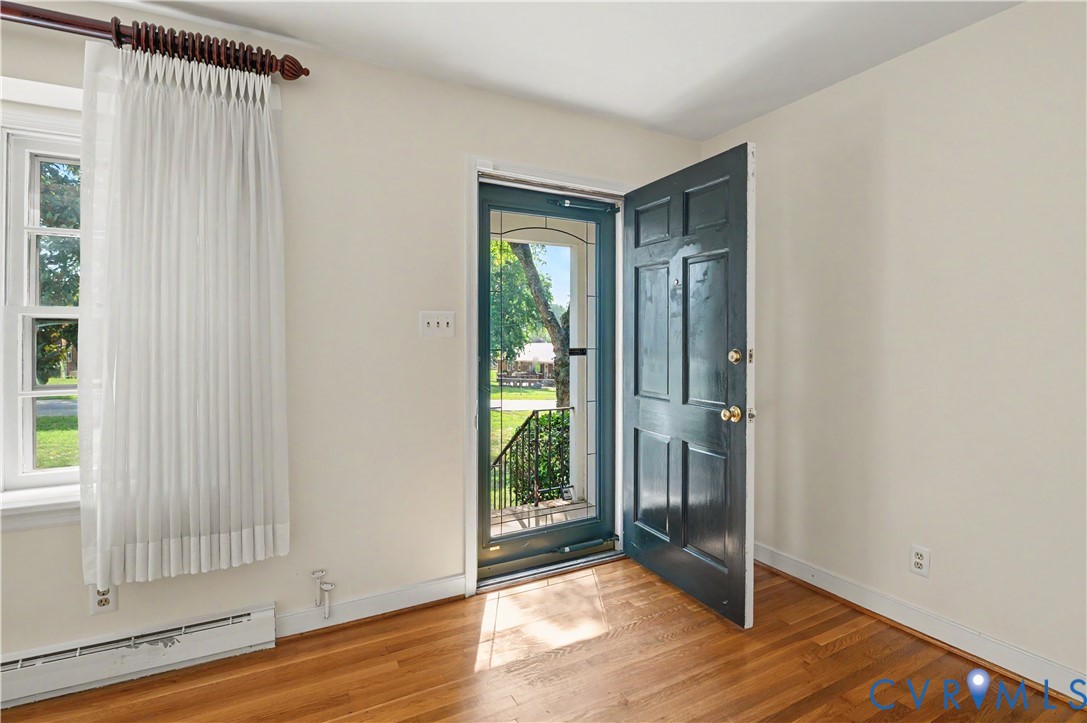 Hardwood floors in formal rooms, bedrooms, and hallway
