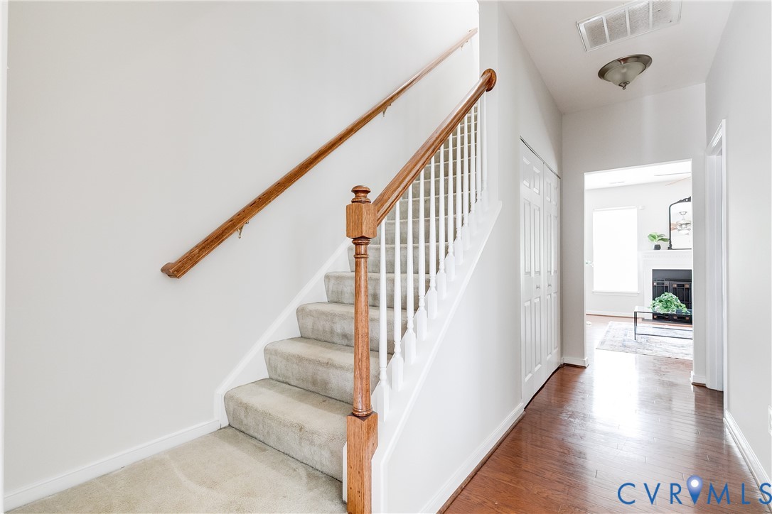Hardwood-finish flooring extending from the entryway