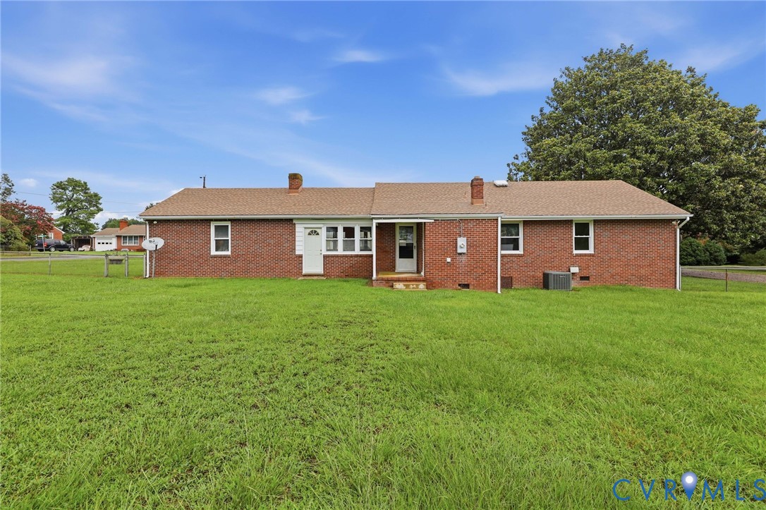 Brick exterior with a shingle roof