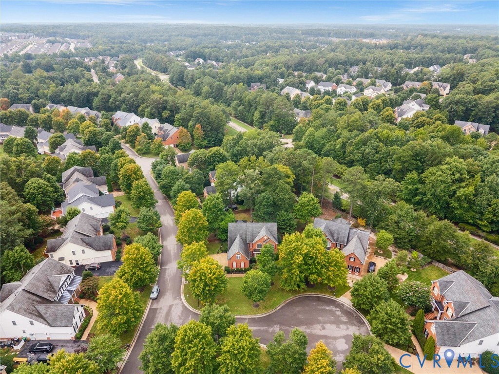 Residential neighborhood featuring mature trees and established homes