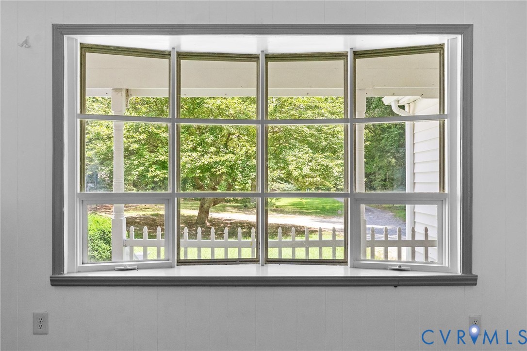 Bay window with white trim and gray framing