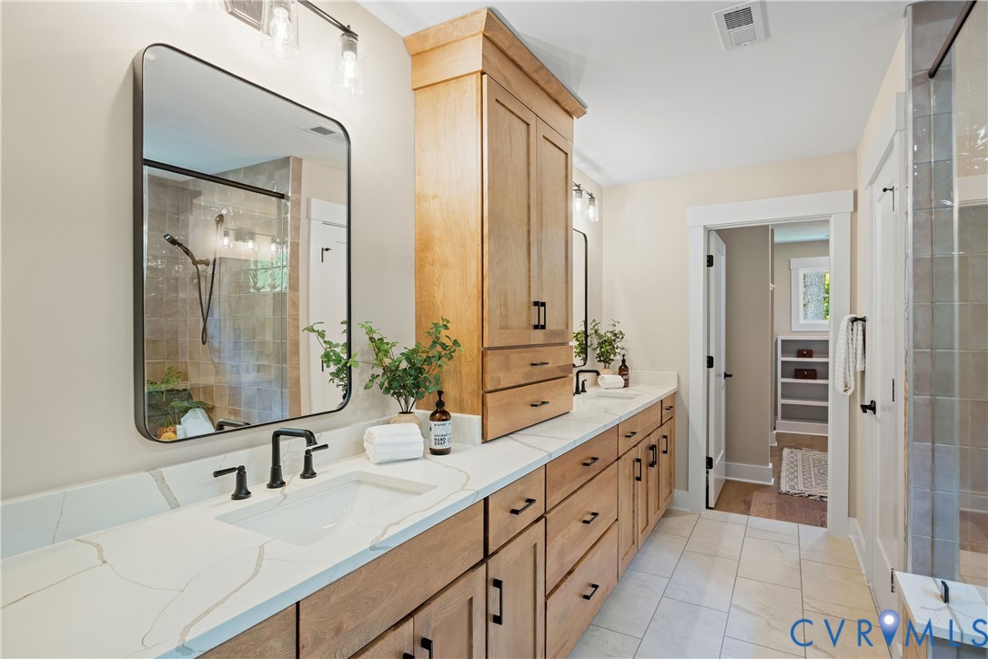 Dual vanity with integrated sinks and white countertops