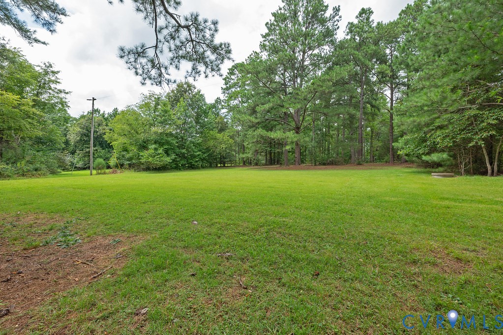 View towards the back of the property beyond the fence