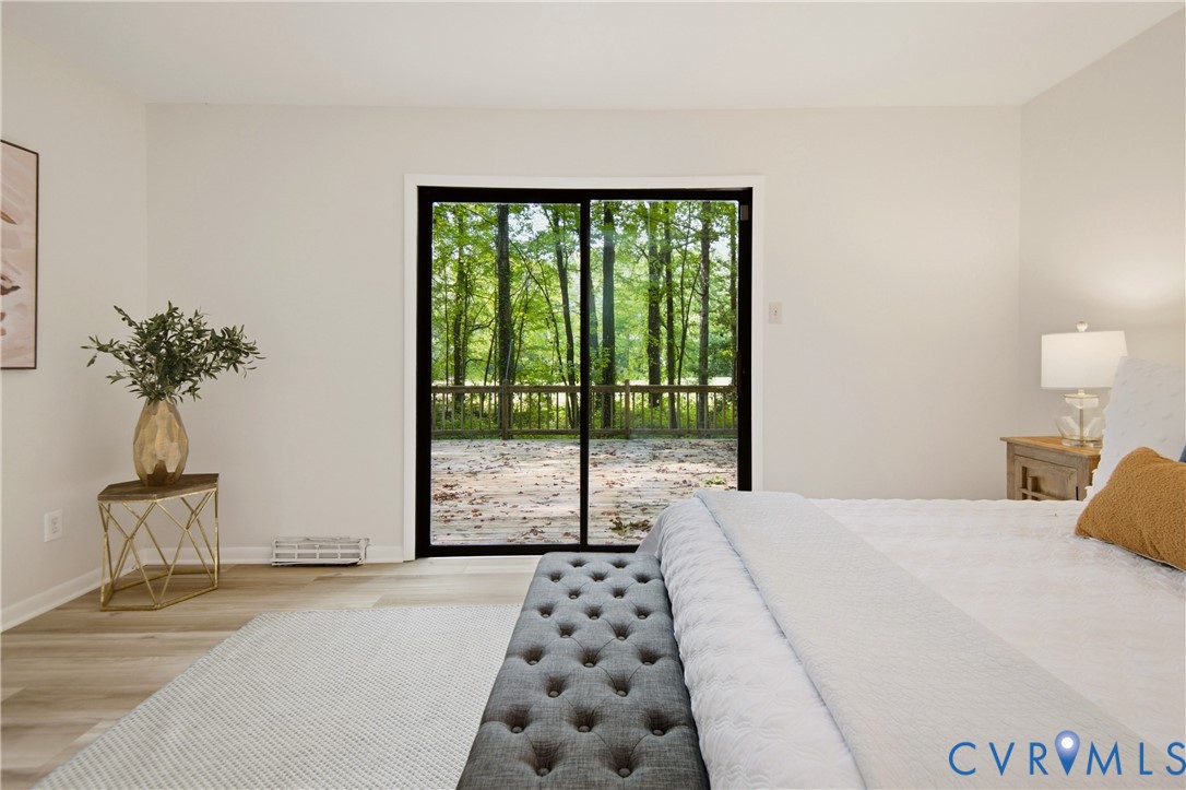 Sliding glass door leading to an outdoor deck
