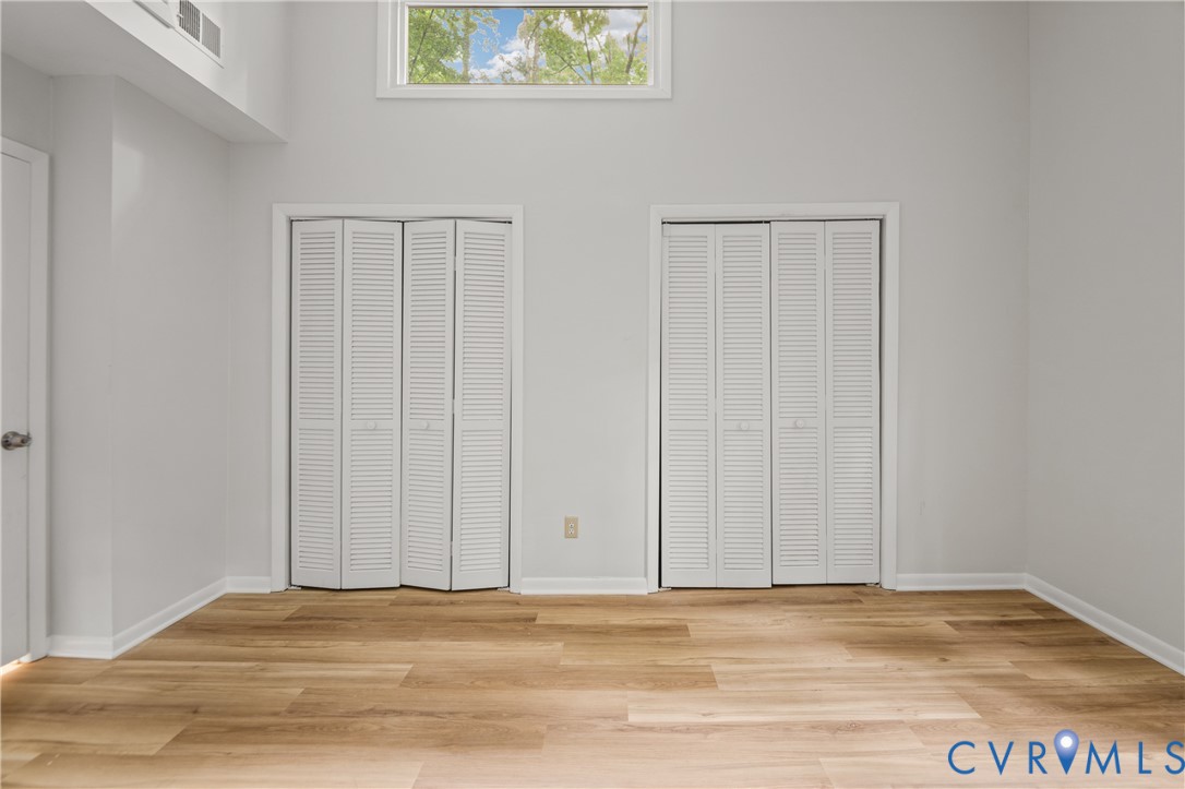 Bright interior space with wood-finish flooring