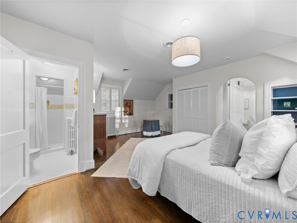 with built-in bookshelves and hardwood floors