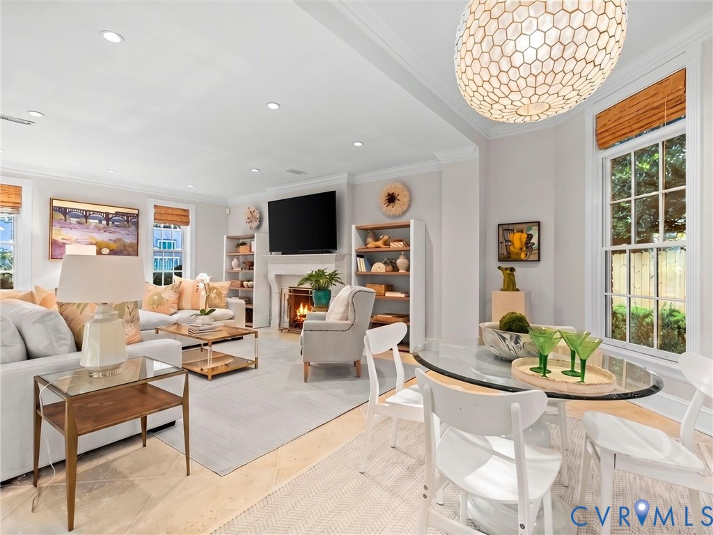 Gracious family room with heated floors and chandelier
