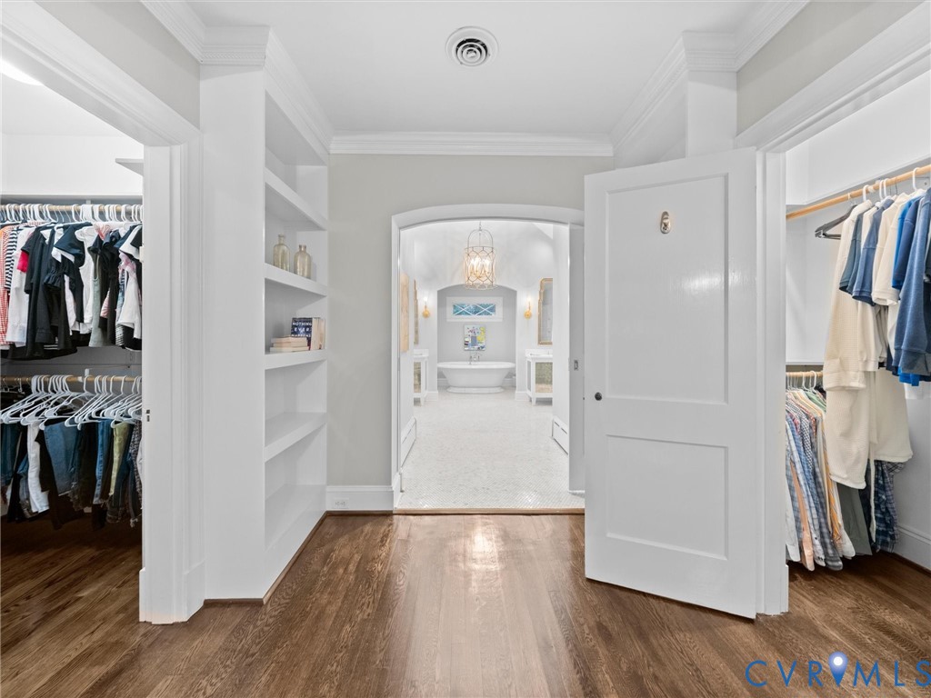 Primary bedroom with his & hers closets