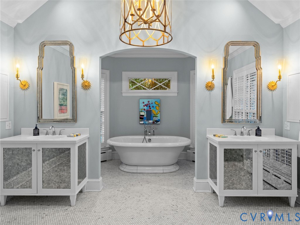 with dual vanities and Carrara marble floors