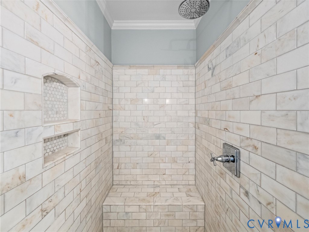 primary shower with Carrara marble tile