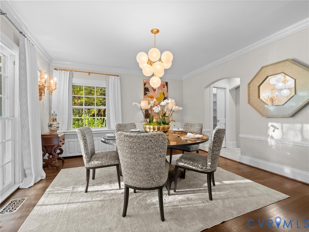 Light and bright dining room with stunning chandelier