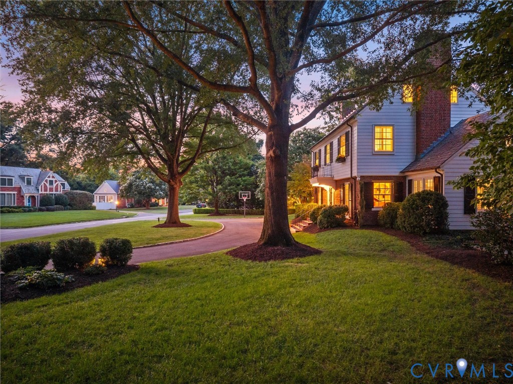 Twilight view of yard