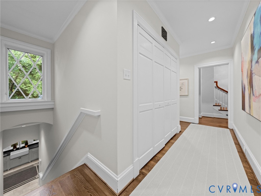 Back staircase to mudroom and family room