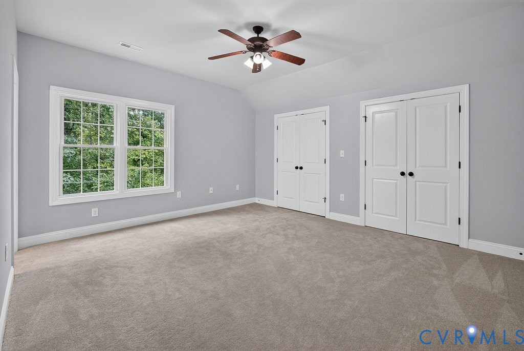 Vaulted ceiling with an attached ceiling fan