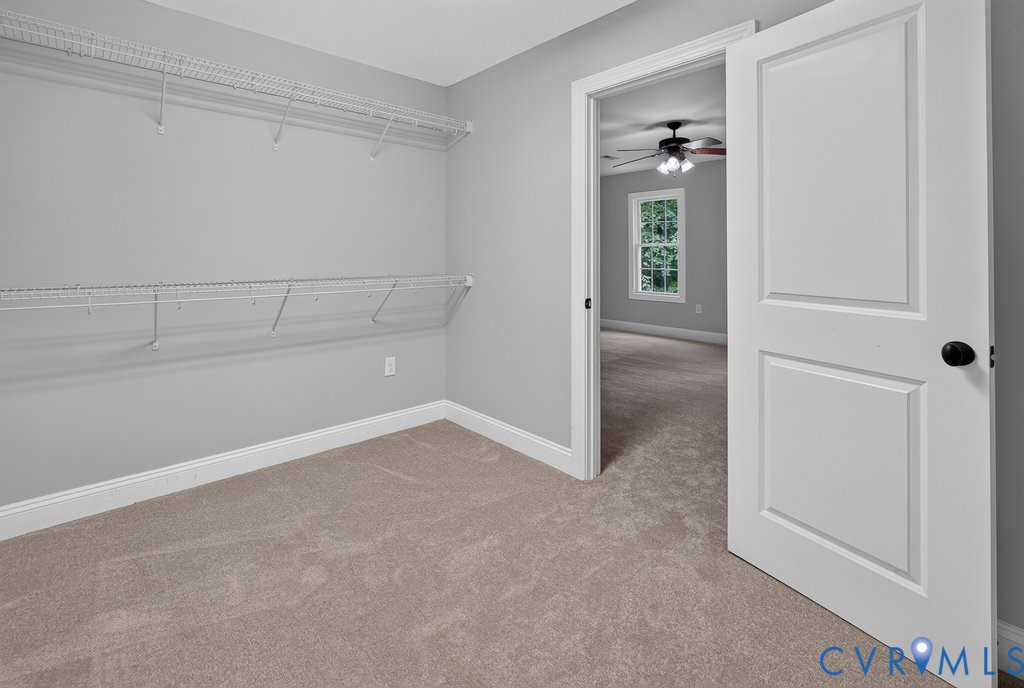 Carpeted closet with built-in wire shelving